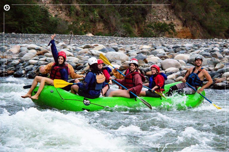 Group of tourists embarking on a thrilling rafting adventure along the rapids on the Inca Jungle Standard
