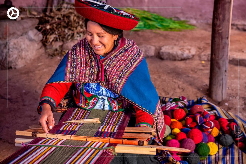 Chinchero woman weaving traditional garments showcases Peru's diversity