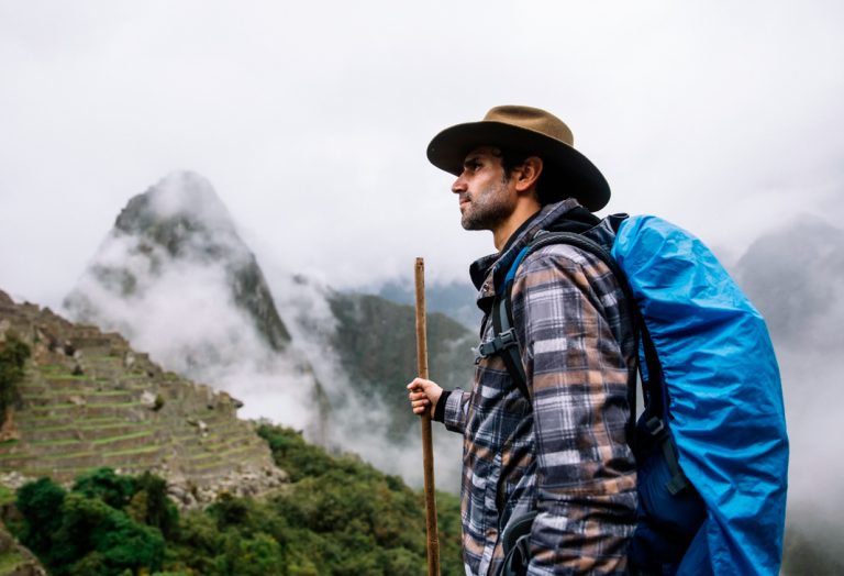 Tourist confidently embracing the conditions on the Inca Trail
