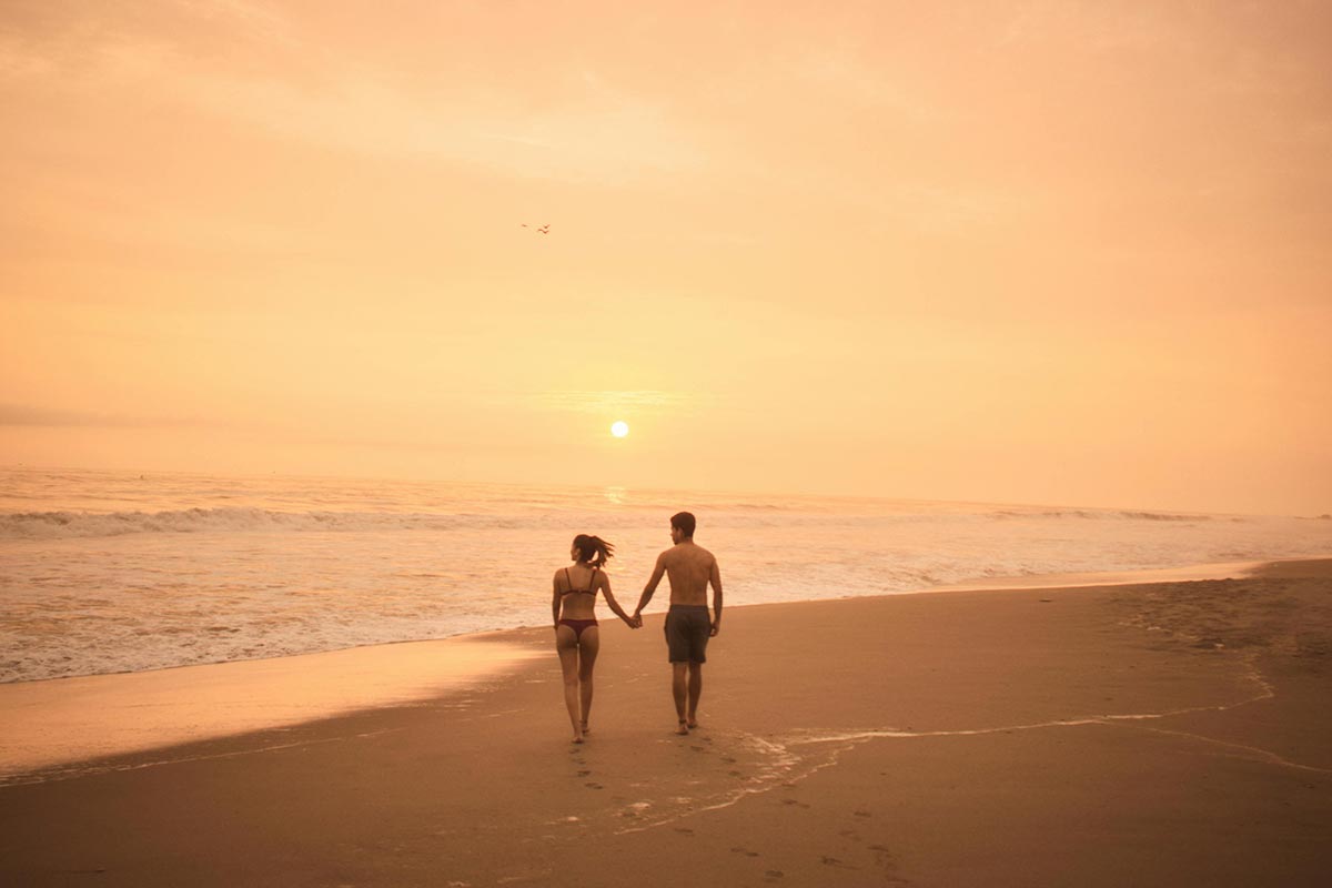 walking in the Mancora beach honeymoon in peru 