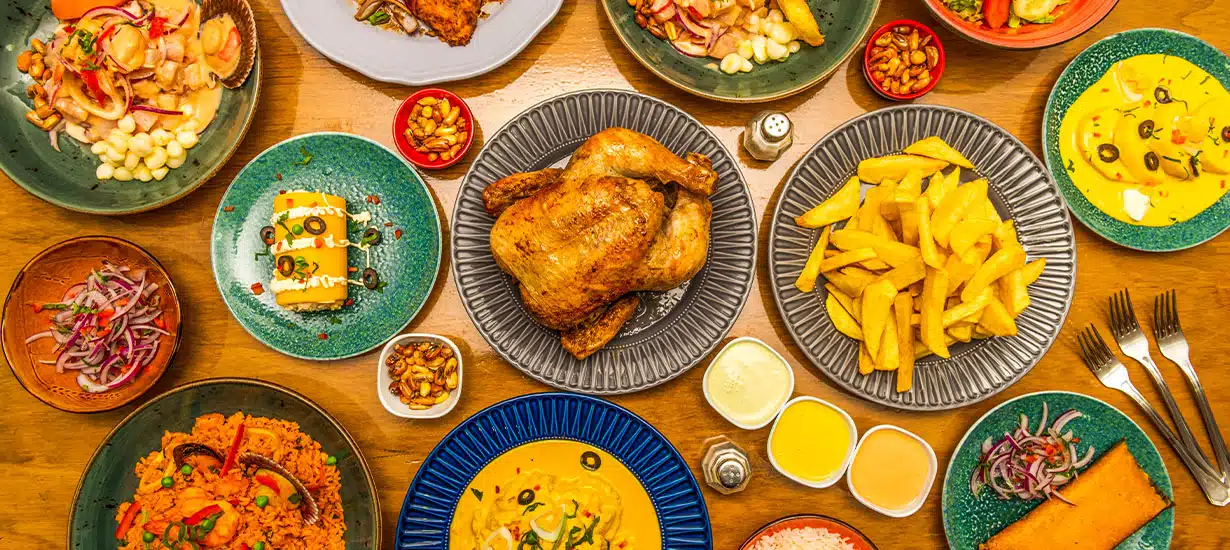 Peruvian Traditional Cuisine Comida Peruana Traditional Peruvian dishes served on a table.