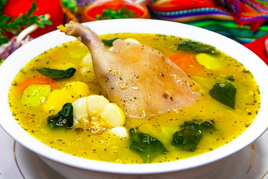 4 platos tradicionales de cuy que debes probar en Perú 4 Caldo de cuy, a traditional Peruvian guinea pig soup with potatoes and herbs.