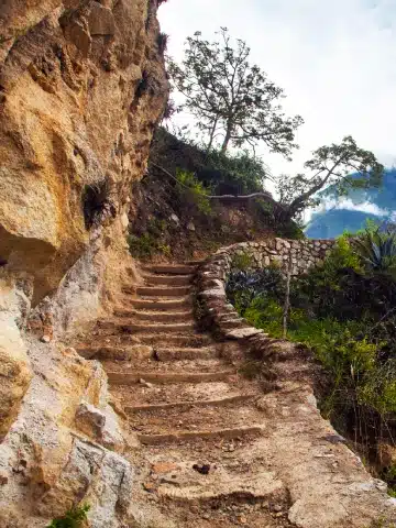 Choquequirao Trek: Distance, Difficulty, Cost, and Itinerary Guide for 2026 3 Steep mountain path on the Choquequirao Trek through the Peruvian Andes.