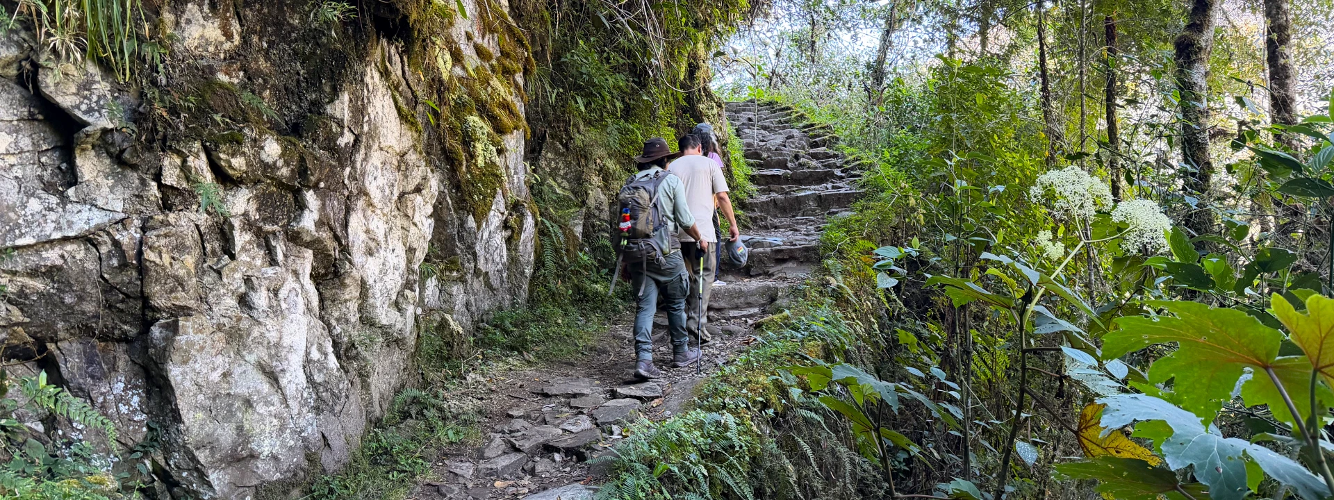 Hikers walking along the original Inca Trail on the way to Machu Picchu.