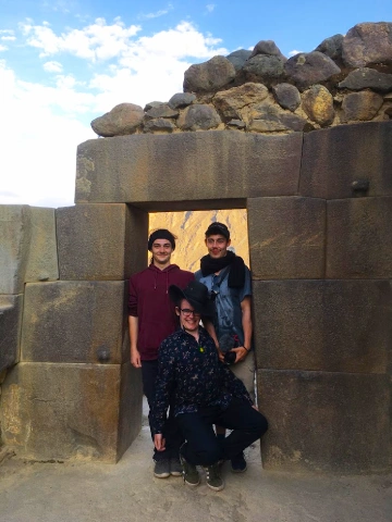 Ollantaytambo Peru: The Complete Visitor Guide to the Living Inca Town 12 Travelers visiting the Ollantaytambo Archaeological Site with a local guide