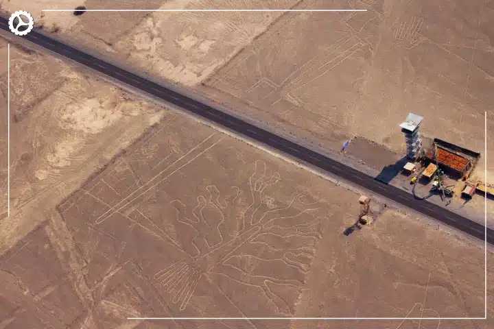 Paracas, Ballestas Islands, Huacachina & Nazca: The Perfect 2-Day Peru Itinerary 2 Aerial view of the Tree geoglyph and the Nazca Lines observation tower in Peru