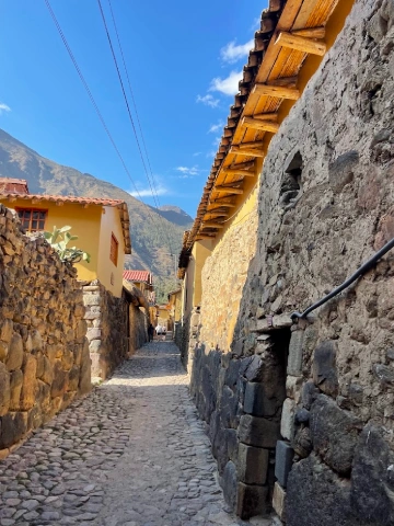 Ollantaytambo Peru: The Complete Visitor Guide to the Living Inca Town 8 Original Inca stone street in Ollantaytambo Town
