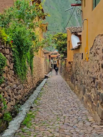 Ollantaytambo Peru: The Complete Visitor Guide to the Living Inca Town 9 Ancient Inca water channel running through Ollantaytambo