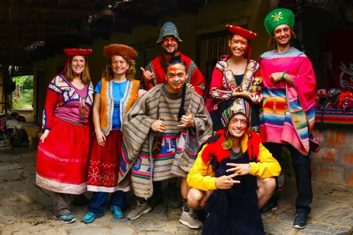 How Difficult Is the Inca Jungle Trek? 4 Inca Jungle travelers with local community